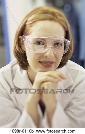 Stock Image - woman, scientist, medicine, goggles, indoors, occupation, Caucasian. Fotosearch