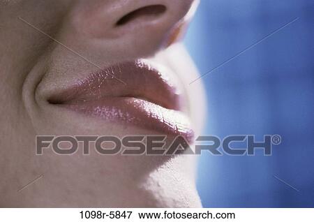 Stock Photo - woman, smiling, nose, mouth, body parts, lips, smile. Fotosearch