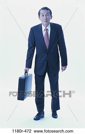 briefcase, Asian, business, Middle-aged, businessman, indoors View Large Photo Image Stock Image - briefcase, Asian, business, Middle-aged, businessman, indoors. Fotosearch