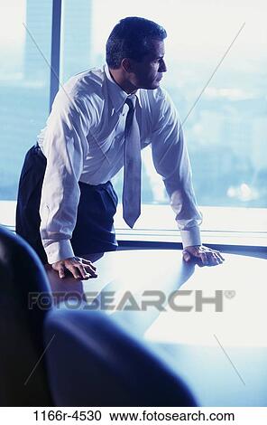 business, Middle-aged, contemplating, businessman, indoors, executive View Large Photo Image Stock Image - business, Middle-aged, contemplating, businessman, indoors, executive. Fotosearch