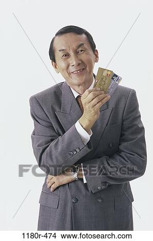 businessman, business, finance, shopping, Middle-aged, Asian View Large Photo Image Picture - businessman, business, finance, shopping, Middle-aged, Asian. Fotosearch