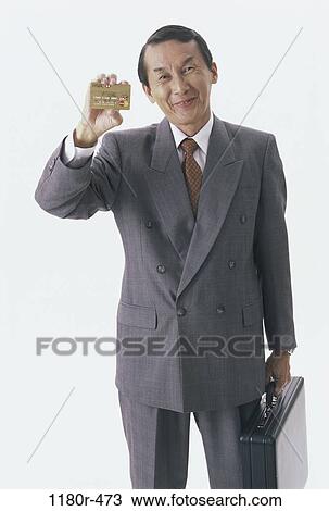 businessman, business, finance, shopping, Middle-aged, Asian View Large Photo Image Stock Image - businessman, business, finance, shopping, Middle-aged, Asian. Fotosearch