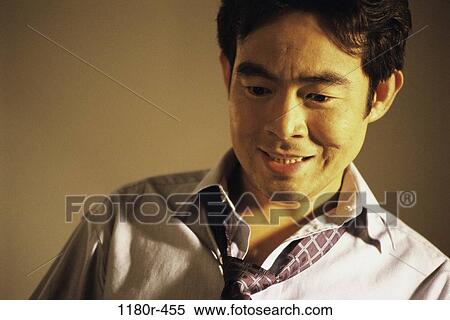Stock Photography - businessman, stress, worry, Middle-aged, business, Asian. Fotosearch