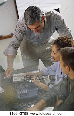 Stock Photo - computer, laptop, business, using, casual, casual dress, use. Fotosearch