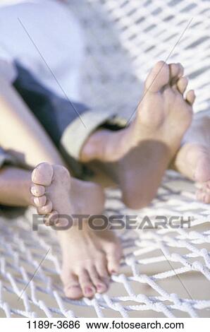 couple, hammock, summer, tranquility, body parts, vacation, feet View Large Photo Image Stock Photograph - couple, hammock, summer, tranquility, body parts, vacation, feet. Fotosearch