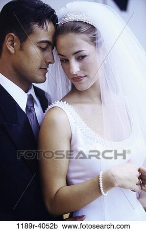 couple, Hispanic, commitment, wedding, love, veil View Large Photo Image Stock Image - couple, Hispanic, commitment, wedding, love, veil. Fotosearch