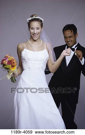 couple, Hispanic, dancing, dance, joyous, wedding, bouquet View Large Photo Image Stock Photo - couple, Hispanic, dancing, dance, joyous, wedding, bouquet. Fotosearch