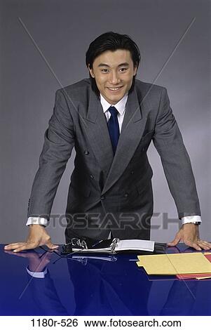 desk, Asian, business, businessman, indoors, executive View Large Photo Image Stock Photograph - desk, Asian, business, businessman, indoors, executive. Fotosearch