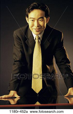desk, Asian, business, Middle-aged, businessman, indoors View Large Photo Image Stock Image - desk, Asian, business, Middle-aged, businessman, indoors. Fotosearch