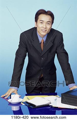 desk, Asian, coffee, business, cup, businessman View Large Photo Image Stock Image - desk, Asian, coffee, business, cup, businessman. Fotosearch