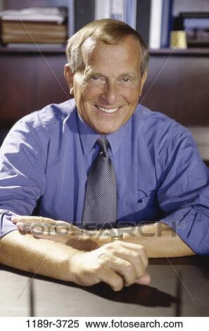 desk, business, Middle-aged, businessman, indoors View Large Photo Image Stock Photography - desk, business, Middle-aged, businessman, indoors. Fotosearch