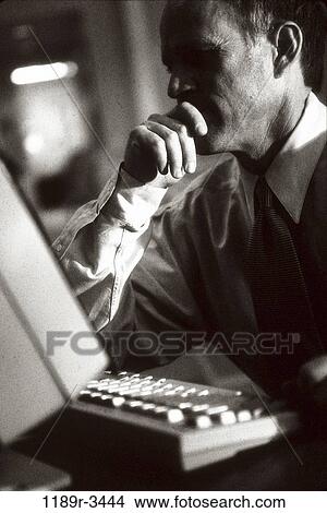 desk, computer, business, Middle-aged, contemplating, businessman View Large Photo Image Picture - desk, computer, business, Middle-aged, contemplating, businessman. Fotosearch