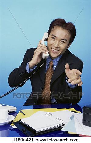 desk, telephone, talking, Asian, phone, business View Large Photo Image Stock Image - desk, telephone, talking, Asian, phone, business. Fotosearch