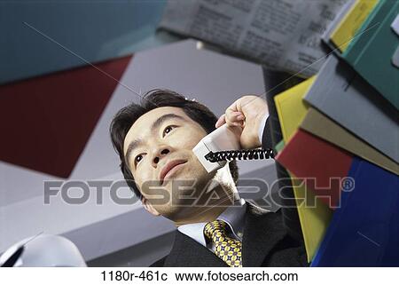 desk, telephone, talking, Asian, phone, business View Large Photo Image Stock Image - desk, telephone, talking, Asian, phone, business. Fotosearch