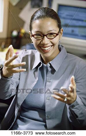 desk, woman, Asian, eyeglasses, computer, business, casual View Large Photo Image Stock Image - desk, woman, Asian, eyeglasses, computer, business, casual. Fotosearch