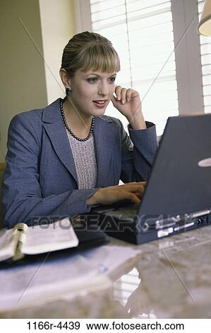 desk, woman, laptop, business, indoors, Caucasian, businesswoman View Large Photo Image Stock Photo - desk, woman, laptop, business, indoors, Caucasian, businesswoman. Fotosearch