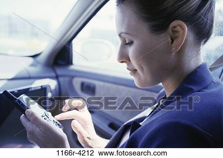 dial, dialing, woman, car, phone, business, cell phone View Large Photo Image Stock Image - dial, dialing, woman, car, phone, business, cell phone. Fotosearch