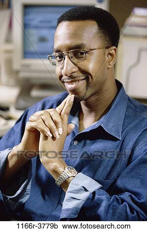 eyeglasses, computer, business, casual, businessman, indoors View Large Photo Image Stock Image - eyeglasses, computer, business, casual, businessman, indoors. Fotosearch