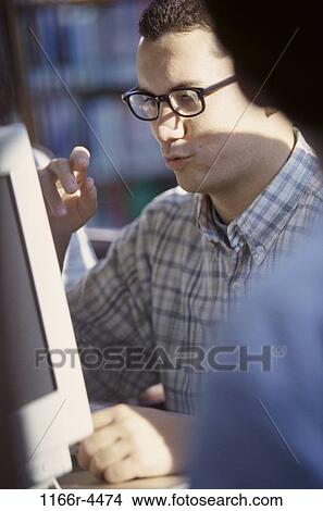 Picture - eyeglasses, computer, education, learning, using, Caucasian. Fotosearch
