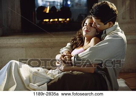 fire, people, couple, fireplace, romantic, embracing, romance View Large Photo Image Stock Image - fire, people, couple, fireplace, romantic, embracing, romance. Fotosearch