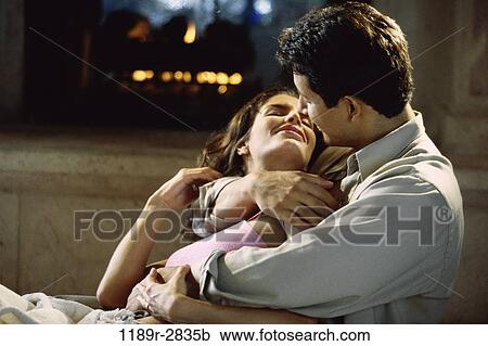 fire, people, couple, fireplace, romantic, embracing, romance View Large Photo Image Stock Image - fire, people, couple, fireplace, romantic, embracing, romance. Fotosearch