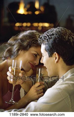 fire, people, couple, wine, champagne, drinking, fireplace View Large Photo Image Stock Image - fire, people, couple, wine, champagne, drinking, fireplace. Fotosearch