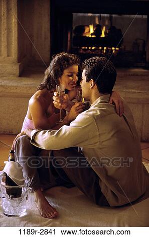 fire, people, couple, wine, champagne, drinking, fireplace View Large Photo Image Stock Image - fire, people, couple, wine, champagne, drinking, fireplace. Fotosearch