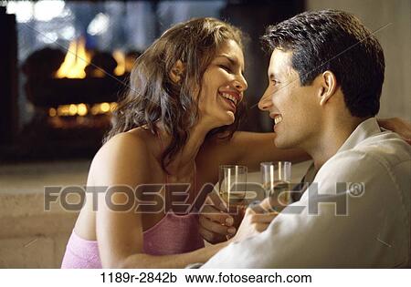 fire, people, couple, wine, champagne, drinking, fireplace View Large Photo Image Stock Image - fire, people, couple, wine, champagne, drinking, fireplace. Fotosearch