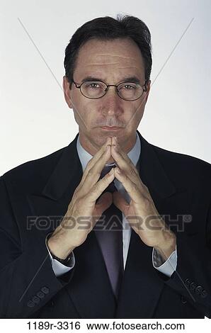 glasses, pensive, business, Middle-aged, contemplating, businessman View Large Photo Image Stock Photograph - glasses, pensive, business, Middle-aged, contemplating, businessman. Fotosearch