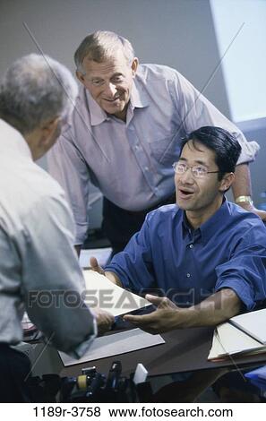 group, multiethnic, desk, business, businessmen, work View Large Photo Image Stock Photo - group, multiethnic, desk, business, businessmen, work. Fotosearch