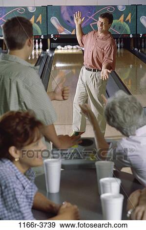Stock Photo - group, people, achievement, accuracy, family, game, applause. Fotosearch