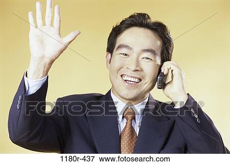 Stock Photo - hand, talking, Asian, business, waving, wave. Fotosearch