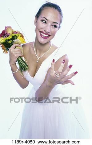 hand, woman, Hispanic, necklace, ring, showing, wedding View Large Photo Image Stock Image - hand, woman, Hispanic, necklace, ring, showing, wedding. Fotosearch