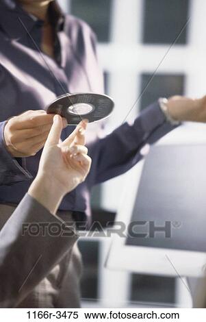 hands, computer, business, using, CD, component, part View Large Photo Image Stock Photography - hands, computer, business, using, CD, component, part. Fotosearch