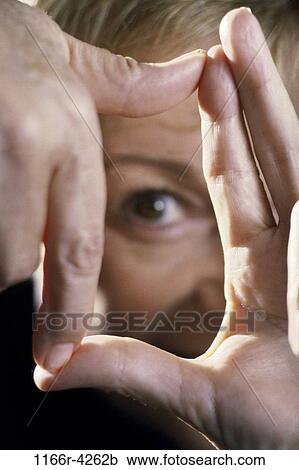 hands, eye, woman, artist, body parts, fingers, framing View Large Photo Image Stock Image - hands, eye, woman, artist, body parts, fingers, framing. Fotosearch