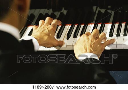 Stock Photo - hands, playing, piano, arts, entertainment, body parts, play. Fotosearch