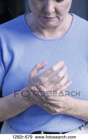 hands, woman, Middle-aged, pain, rubbing, indoors, massage View Large Photo Image Stock Photo - hands, woman, Middle-aged, pain, rubbing, indoors, massage. Fotosearch