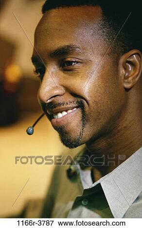 headset, business, Middle-aged, businessman, customer service, African-American View Large Photo Image Stock Photo - headset, business, Middle-aged, businessman, customer service, African-American. Fotosearch