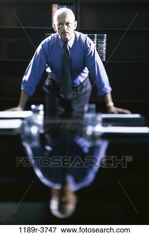 Hispanic, business, Middle-aged, serious, businessman, indoors View Large Photo Image Stock Photo - Hispanic, business, Middle-aged, serious, businessman, indoors. Fotosearch