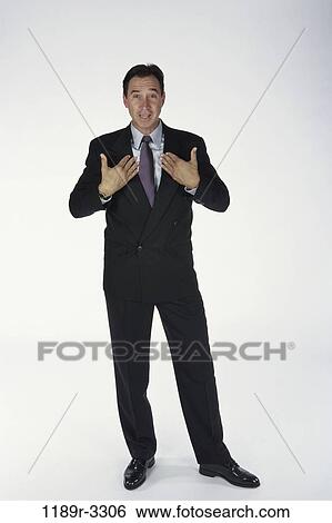 Stock Photograph - Hispanic, business, Middle-aged, frustrated, angry, businessman. Fotosearch