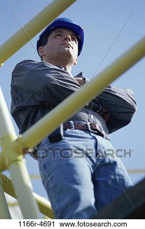 industry, construction, worker, outdoors, Middle-aged, serious View Large Photo Image Stock Image - industry, construction, worker, outdoors, Middle-aged, serious. Fotosearch