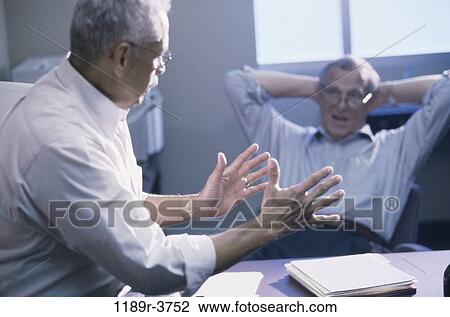 meeting, men, Hispanic, business, Middle-aged, businessmen View Large Photo Image Stock Image - meeting, men, Hispanic, business, Middle-aged, businessmen. Fotosearch