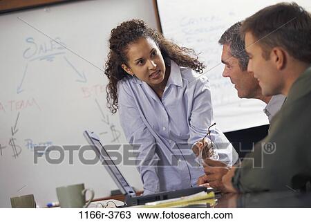 meeting, presentation, laptop, business, indoors, casual dress, businesspeople View Large Photo Image Stock Image - meeting, presentation, laptop, business, indoors, casual dress, businesspeople. Fotosearch