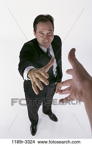 men, business, Middle-aged, posing, greeting, businessmen, handshake View Large Photo Image Picture - men, business, Middle-aged, posing, greeting, businessmen, handshake. Fotosearch