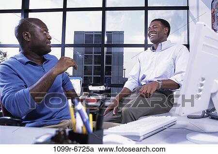 men, desk, business, businessmen, indoors, African-American View Large Photo Image Stock Image - men, desk, business, businessmen, indoors, African-American. Fotosearch