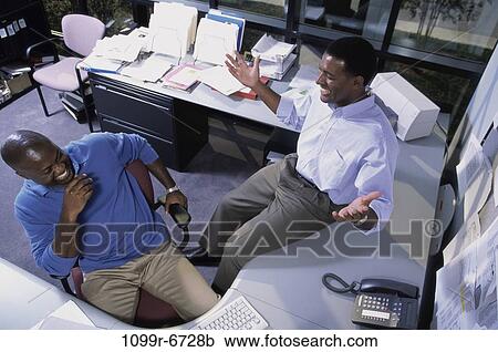 men, desk, business, businessmen, indoors, African-American View Large Photo Image Stock Image - men, desk, business, businessmen, indoors, African-American. Fotosearch