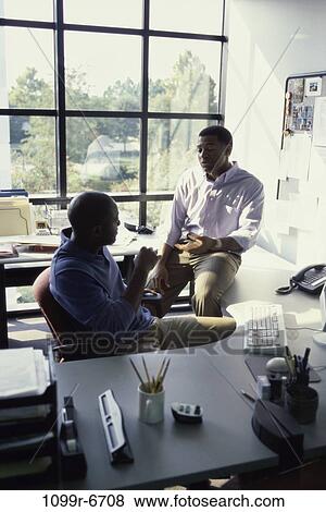 men, desk, business, businessmen, indoors, African-American View Large Photo Image Stock Photo - men, desk, business, businessmen, indoors, African-American. Fotosearch