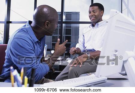 men, desk, business, businessmen, indoors, African-American View Large Photo Image Stock Photograph - men, desk, business, businessmen, indoors, African-American. Fotosearch