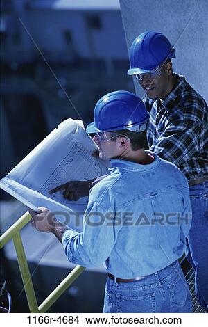 men, industry, construction, teamwork, blueprints, workers, occupation View Large Photo Image Picture - men, industry, construction, teamwork, blueprints, workers, occupation. Fotosearch