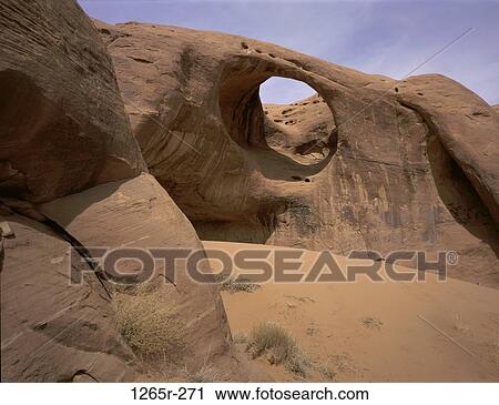 Moccasin Arch, Monument Valley, Arizona, USA View Large Photo Image Stock Image - Moccasin Arch, Monument Valley, Arizona, USA. Fotosearch